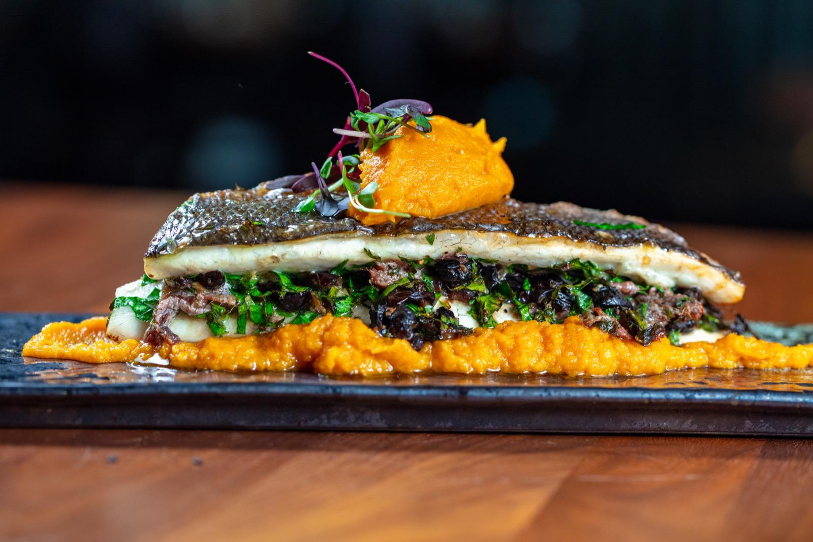 Fresh grilled sea bass at Alma Grill & Bar